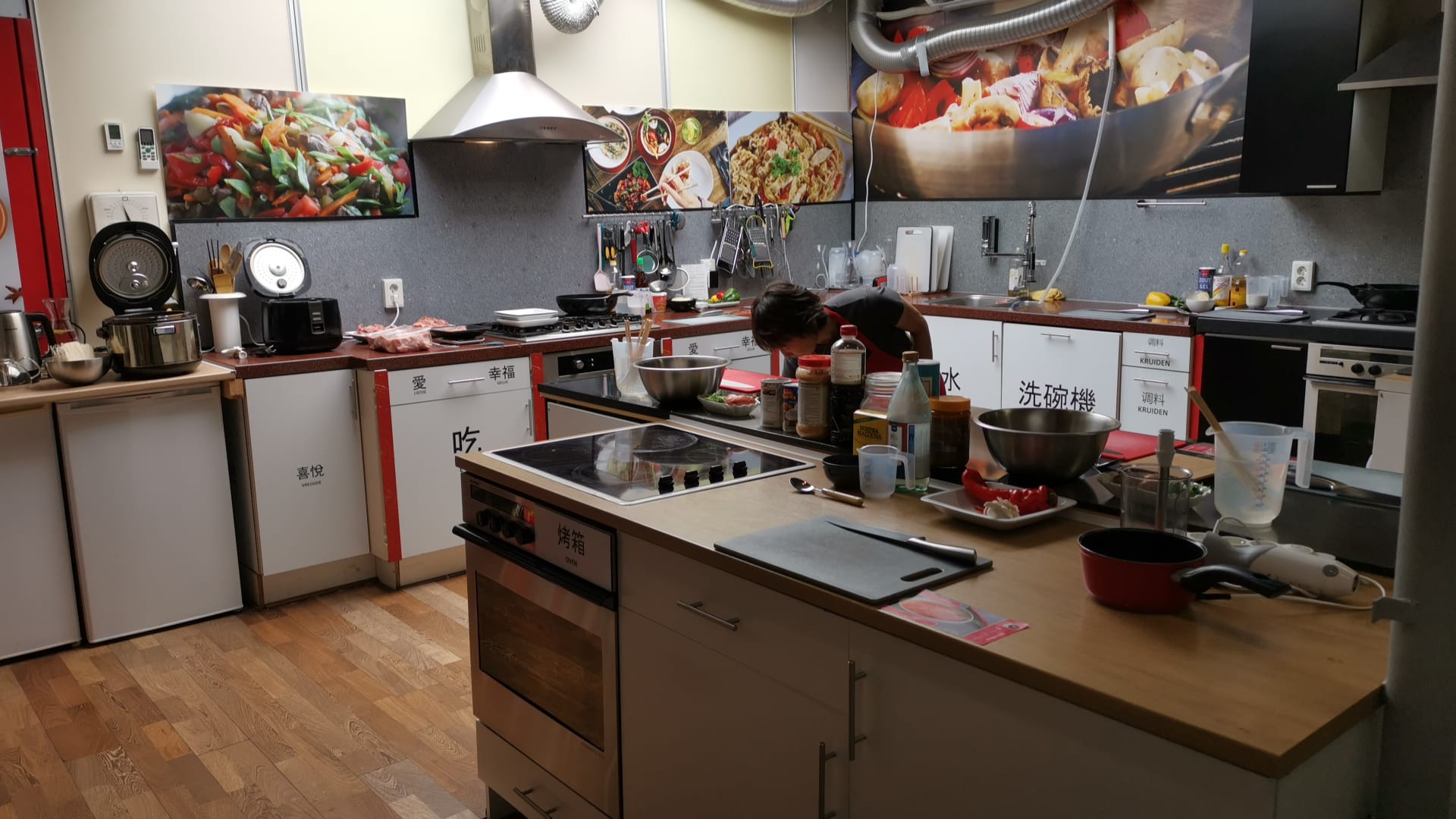 Julia's cooking studio, kitchen with Chinese characters on the cabinets